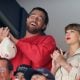 Travis Kelce, left, and Taylor Swift react as the Edmonton Oilers and the Florida Panthers play during the first period in Game Four of the 2025 Stanley Cup Final at Amerant Bank Arena on June 12, 2025 in Sunrise, Florida.