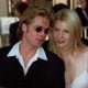 Actor Brad Pitt, nominee for best supporting actor for his role as " Jeffrey Goines" in "12 Monkeys" and his companion Gwyneph Paltrow arrives at the Dorothy Chandler Pavillion in Los Angeles 25 March for the 68th annual Academy awards.