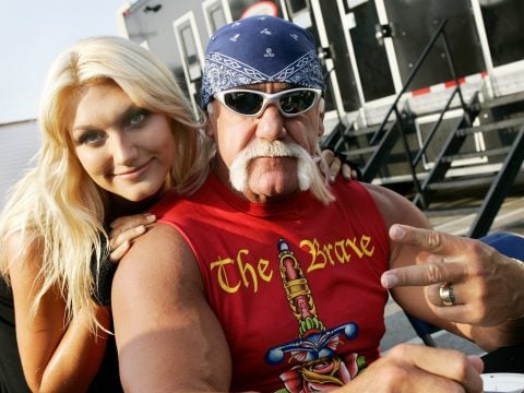 Pro-wrestler Hulk Hogan poses with daughter Brooke Hogan on the set of her music video shoot 'Bout Us' on May 6, 2006 in Los Angeles, California.