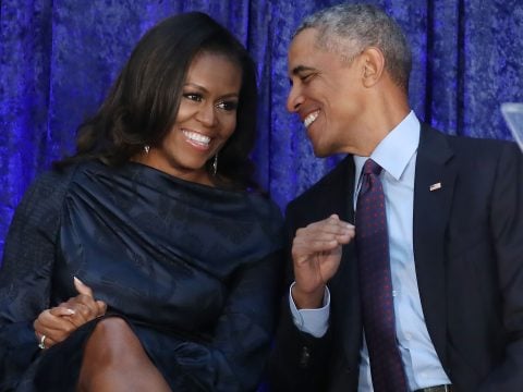 Former U.S. President Barack Obama and first lady Michelle Obama participate in the unveiling of their official portraits during a ceremony at the Smithsonian's National Portrait Gallery, on February 12, 2018 in Washington, DC.