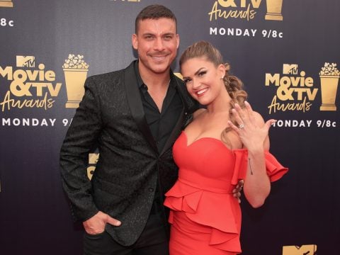 TV personalities Jax Taylor and Brittany Cartwright attend the 2018 MTV Movie And TV Awards at Barker Hangar on June 16, 2018 in Santa Monica, California.