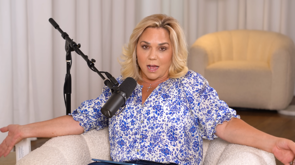 Julie Chrisley in a grandma's china blouse.