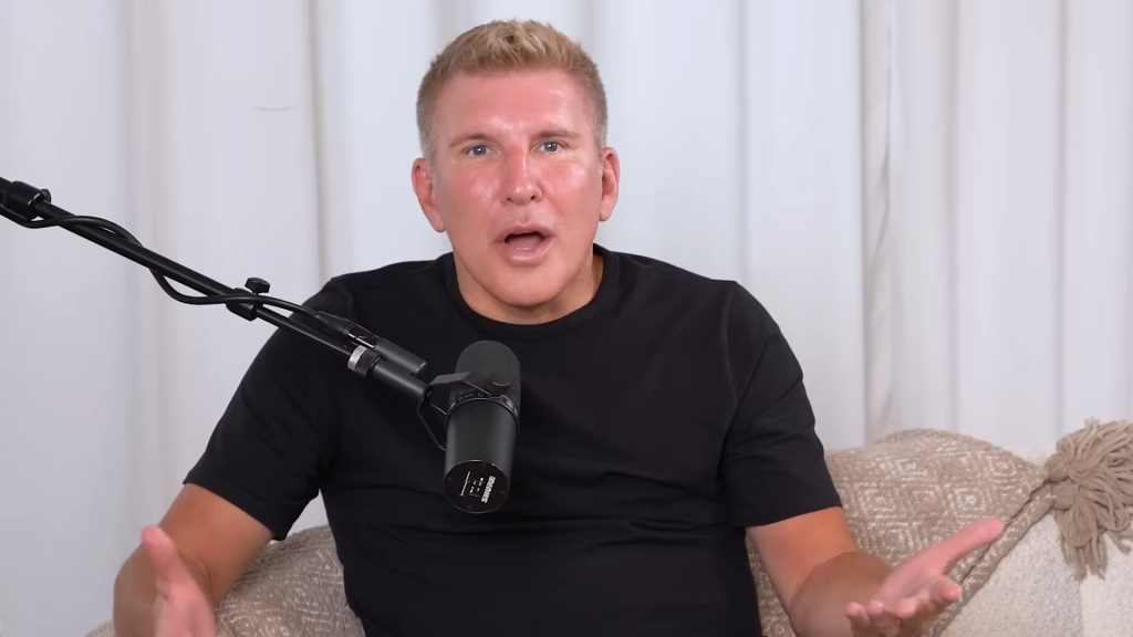 Todd Chrisley and a podcast mic.