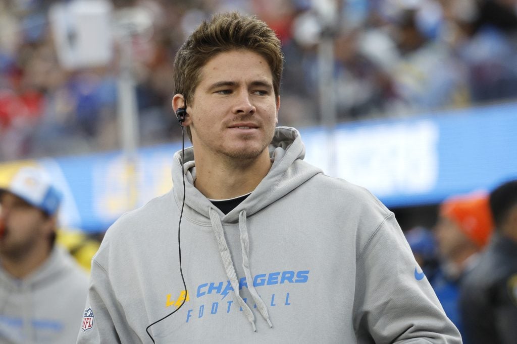 Justin Herbert #10 of the Los Angeles Chargers looks on from the sidelines during a game against the Kansas City Chiefs at SoFi Stadium on January 07, 2024 in Inglewood, California.