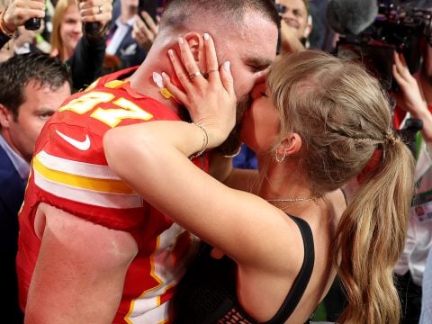 Travis Kelce #87 of the Kansas City Chiefs kisses Taylor Swift after defeating the San Francisco 49ers 25-22 during Super Bowl LVIII at Allegiant Stadium on February 11, 2024 in Las Vegas, Nevada.