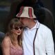Singer-songwriter Taylor Swift and Travis Kelce of the Kansas City Chiefs attend the Men's Singles Final match between Taylor Fritz of the United States and Jannik Sinner of Italy on Day Fourteen of the 2024 US Open at USTA Billie Jean King National Tennis Center on September 08, 2024 in the Flushing neighborhood of the Queens borough of New York City.
