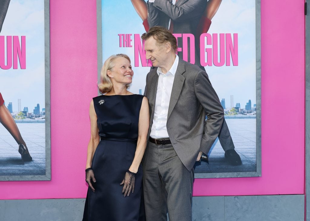 Pamela Anderson and Liam Neeson attend