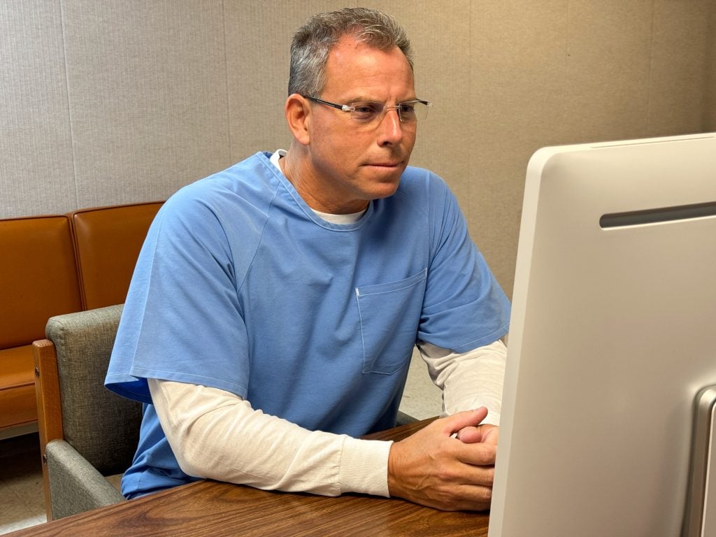 Erik Menendez appears before the parole board via teleconference at the Richard J. Donovan Correctional Facility on August 21, 2025,  in San Diego. 