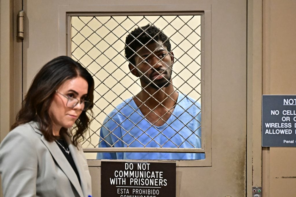 US rapper Lil Nas X, alongside his attorney Christy O'Connor (L), attends his arraignment at Los Angeles Superior Court in Los Angeles, California, on August 25, 2025.