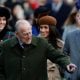 Britain's Prince Philip, Duke of Edinburgh (C) gestures as he is followed by (L-R) Britain's Catherine, Duchess of Cambridge, US actress and fiancee of Britain's Prince Harry Meghan Markle and Britain's Prince Harry arriving to attend the Royal Family's traditional Christmas Day church service at St Mary Magdalene Church in Sandringham, Norfolk, eastern England, on December 25, 2017.