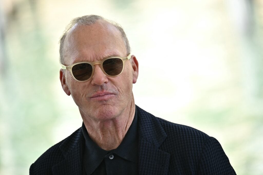 Michael Keaton dressed in shadows.