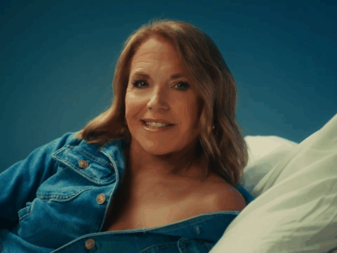 Katie Couric in an open denim jacket.