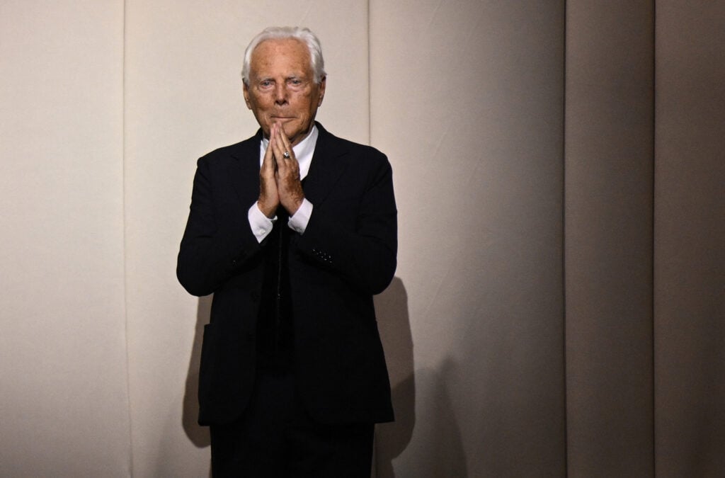 Italian fashion designer Giorgio Armani acknowledges the audience at the end of the Giorgio Armani Prive show as part of the Women's Haute-Couture Fall/Winter 2023/2024 Fashion Week in Paris on July 4, 2023.