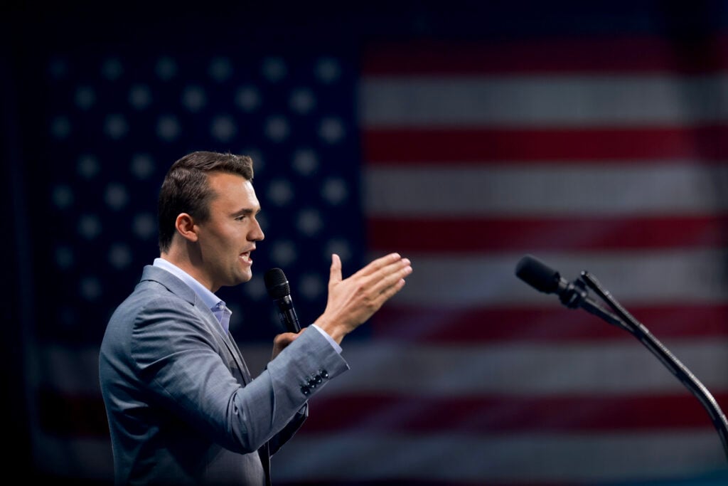 Charlie Kirk, who founded Turning Point USA, speaks before former President Donald Trump's arrival during a Turning Point USA Believers Summit conference at the Palm Beach Convention Center on July 26, 2024 in West Palm Beach, Florida.