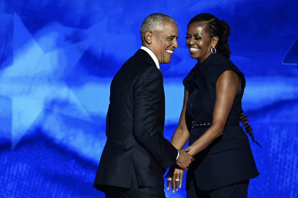 Former US President Barack Obama arrives onstage after his wife and former First Lady Michelle Obama introduced him on the second day of the Democratic National Convention (DNC) at the United Center in Chicago, Illinois, on August 20, 2024.