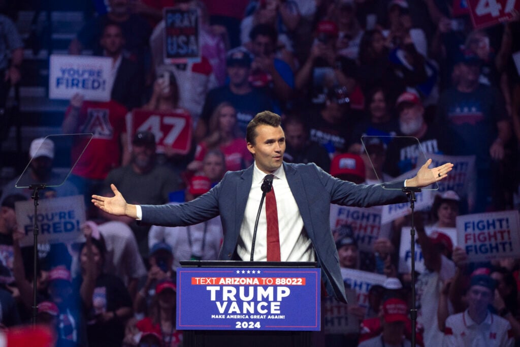 Turning Point USA Founder Charlie Kirk speaks during a campaign rally for Republican presidential nominee, former U.S. President Donald Trump at Desert Diamond Arena on August 23, 2024 in Glendale, Arizona.