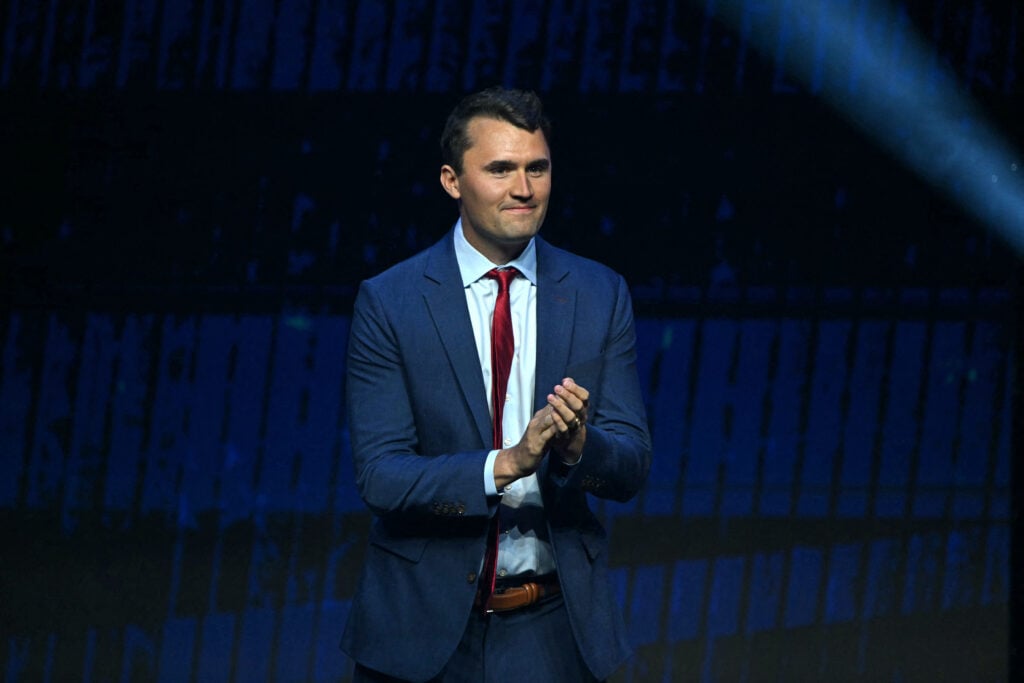 Conservative political activist and founder of Turning Point Action Charlie Kirk takes the stage during a Turning Point Action 'United for Change' campaign rally for former US President and Republican presidential candidate Donald Trump at Thomas & Mack Center in Las Vegas, Nevada, on October 24, 2024. 