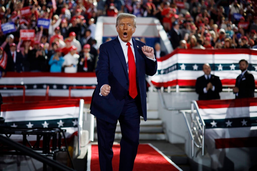Republican presidential nominee, former President Donald Trump dances off stage at the conclusion of a campaign rally at the J.S. Dorton Arena on November 04, 2024 in Raleigh, North Carolina.