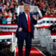 Republican presidential nominee, former President Donald Trump dances off stage at the conclusion of a campaign rally at the J.S. Dorton Arena on November 04, 2024 in Raleigh, North Carolina.