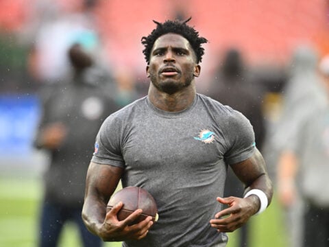 Tyreek Hill #10 of the Miami Dolphins warms up before the game against the Cleveland Browns at Huntington Bank Field on December 29, 2024 in Cleveland, Ohio.
