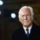 Italian designer Giorgio Armani acknowledges the applause at the end of his presentation for Armani Prive during the Women's Haute-Couture Spring/Summer 2025 Fashion Week to mark its 20th anniversary, in Paris on January 28, 2025.