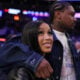 NFL Player Stefon Diggs (R) and rapper Cardi B (L) celebrate after Game Four of the Eastern Conference Second Round NBA Playoffs between the Boston Celtics and the New York Knicks at Madison Square Garden on May 12, 2025 in New York City.