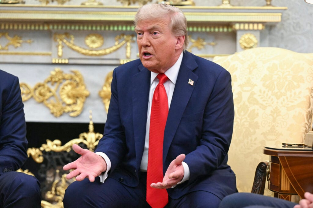 US President Donald Trump hosts Polish President Karol Nawrocki (L) in the Oval Office at the White House in Washington, DC on September 3, 2025.