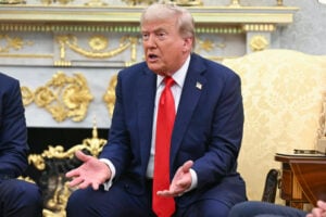 US President Donald Trump hosts Polish President Karol Nawrocki (L) in the Oval Office at the White House in Washington, DC on September 3, 2025.