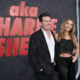 US actor Charlie Sheen and US actress Denise Richards attend the Los Angeles premiere of Netflix's "aka Charlie Sheen" at the Tudum theatre in Hollywood, California, on September 4, 2025.
