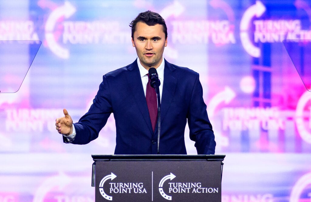 US right-wing activist Charlie Kirk speaks on stage at America Fest 2024 in Phoenix, Arizona, on December 22, 2024. Right-wing youth activist and influencer Charlie Kirk, a major ally of President Donald Trump, was shot dead on September 10, 2025 in a murder that sparked fears of more political violence in an increasingly febrile United States.