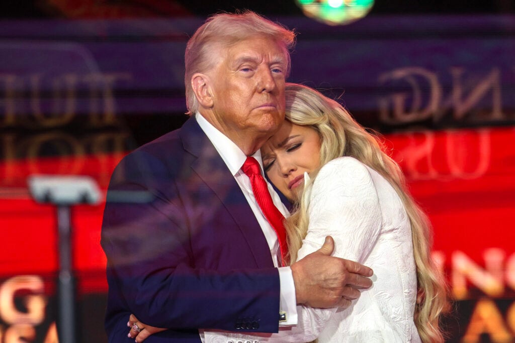 Erika Kirk joins U.S. President Donald Trump onstage during the memorial service for political activist Charlie Kirk at State Farm Stadium on September 21, 2025 in Glendale, Arizona. Kirk, the CEO and co-founder of Turning Point USA, was shot and killed on September 10th while speaking at an event during his "American Comeback Tour" at Utah Valley University.
