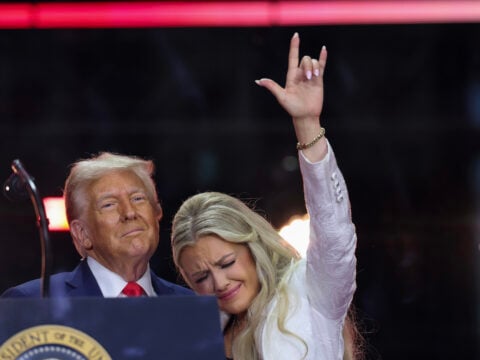 Erika Kirk joins U.S. President Donald Trump onstage during the memorial service for political activist Charlie Kirk at State Farm Stadium on September 21, 2025 in Glendale, Arizona.