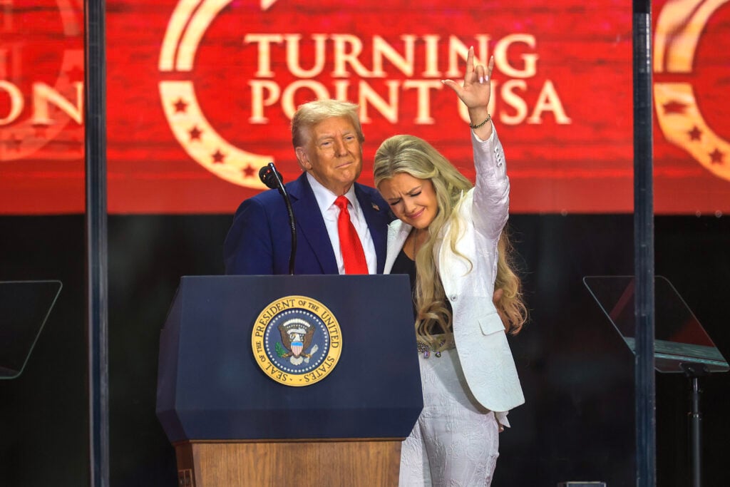 Mrs. Erika Kirk joins U.S. President Donald Trump onstage during the memorial service for political activist Charlie Kirk at State Farm Stadium on September 21, 2025 in Glendale, Arizona. 