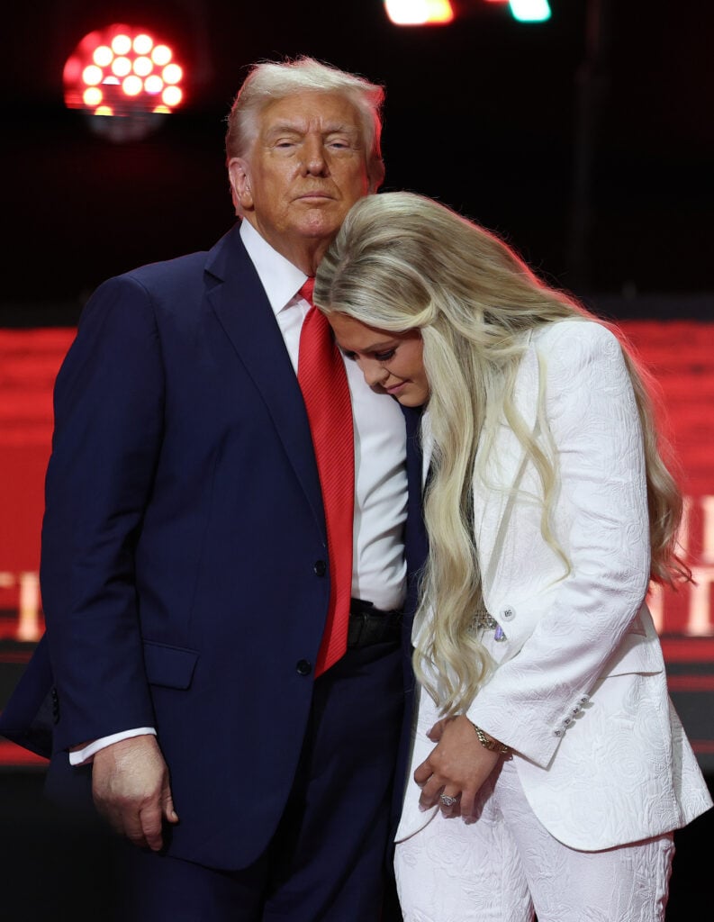Erika Kirk joins U.S. President Donald Trump onstage during the memorial service for political activist Charlie Kirk at State Farm Stadium on September 21, 2025 in Glendale, Arizona.