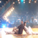 Hilaria Baldwin sitting on the DWTS stage.