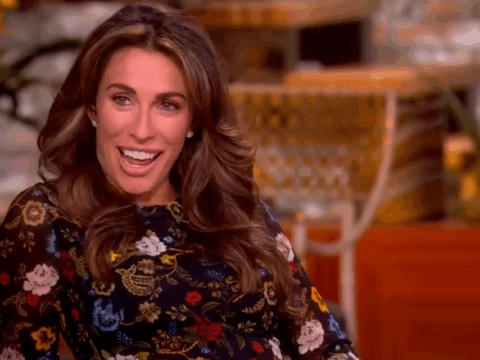 Alyssa Farah Griffin smiles and cups her baby bump on The View.