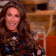 Alyssa Farah Griffin smiles and cups her baby bump on The View.
