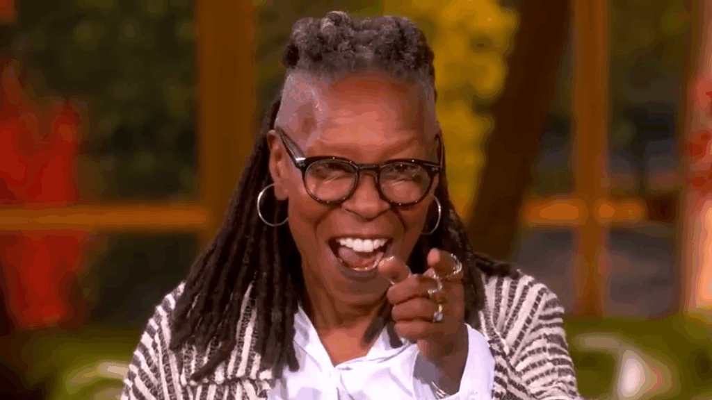 Whoopi Goldberg points triumphantly in October 2025.