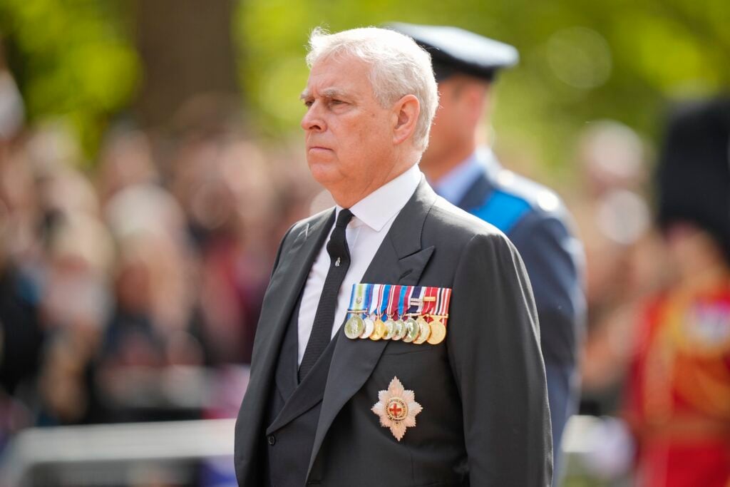 Prince Andrew, Duke of York walks behind the coffin during the ceremonial procession of the coffin of Queen Elizabeth II from Buckingham Palace to Westminster Hall on September 14, 2022 in London, United Kingdom.