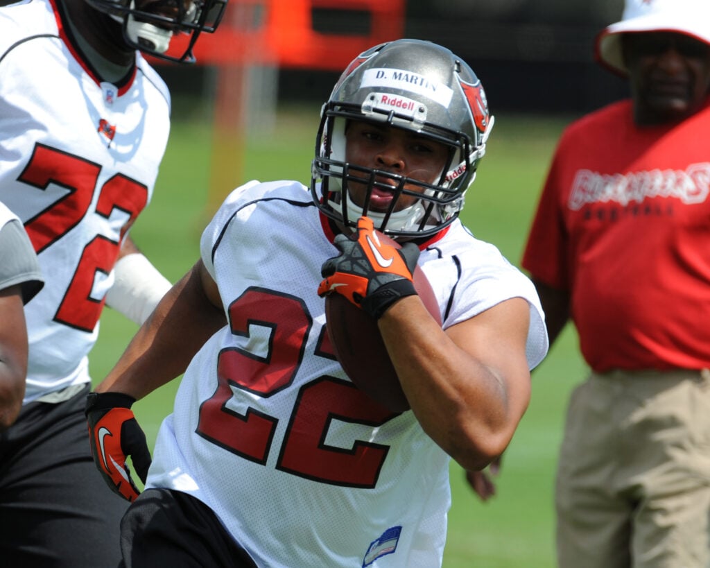 Running back Doug Martin #22 of the Tampa Bay Buccaneers rushes upfield during a rookie practice at the Buccaneers practice facility May 4, 2012 in Tampa, Florida.