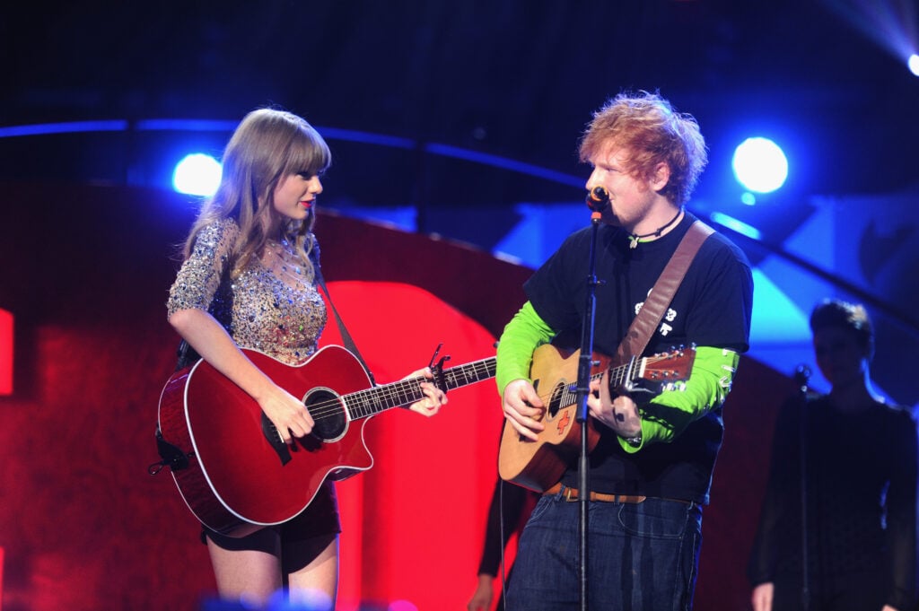 Taylor Swift and Ed Sheeran perform onstage during Z100's Jingle Ball 2012, presented by Aeropostale, at Madison Square Garden on December 7, 2012 in New York City.  