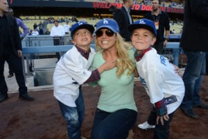 Britney Spears poses with sons Jayden James Federline (L) and Sean Preston Federline (R) during a game against the San Diego Padres at Dodger Stadium on April 17, 2013 in Los Angeles, California.