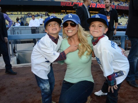 Britney Spears poses with sons Jayden James Federline (L) and Sean Preston Federline (R) during a game against the San Diego Padres at Dodger Stadium on April 17, 2013 in Los Angeles, California.