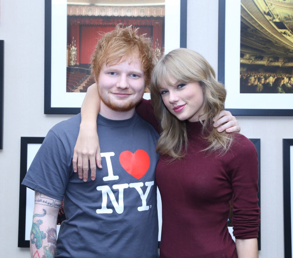 Ed Sheeran poses with Taylor Swift backstage before his sold-out show at Madison Square Garden Arena on November 1, 2013 in New York City.  