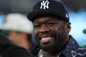 Rapper 50 Cent is seen on the sidelines prior to the game between the Buffalo Bills and the New York Jets at MetLife Stadium on October 14, 2024 in East Rutherford, New Jersey.