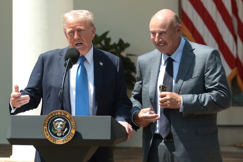 U.S. President Donald Trump speaks alongside Dr. Phil McGraw during a National Day of Prayer event in the Rose Garden at the White House on May 1, 2025 in Washington, DC.