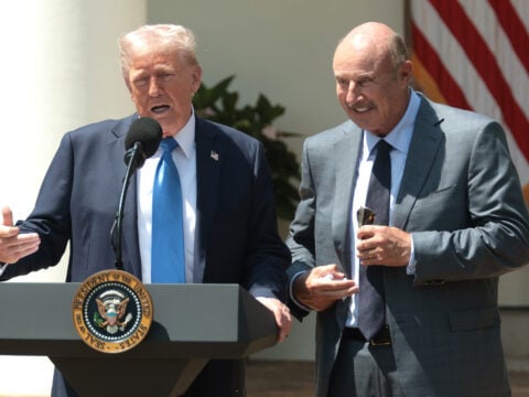 U.S. President Donald Trump speaks alongside Dr. Phil McGraw during a National Day of Prayer event in the Rose Garden at the White House on May 1, 2025 in Washington, DC.