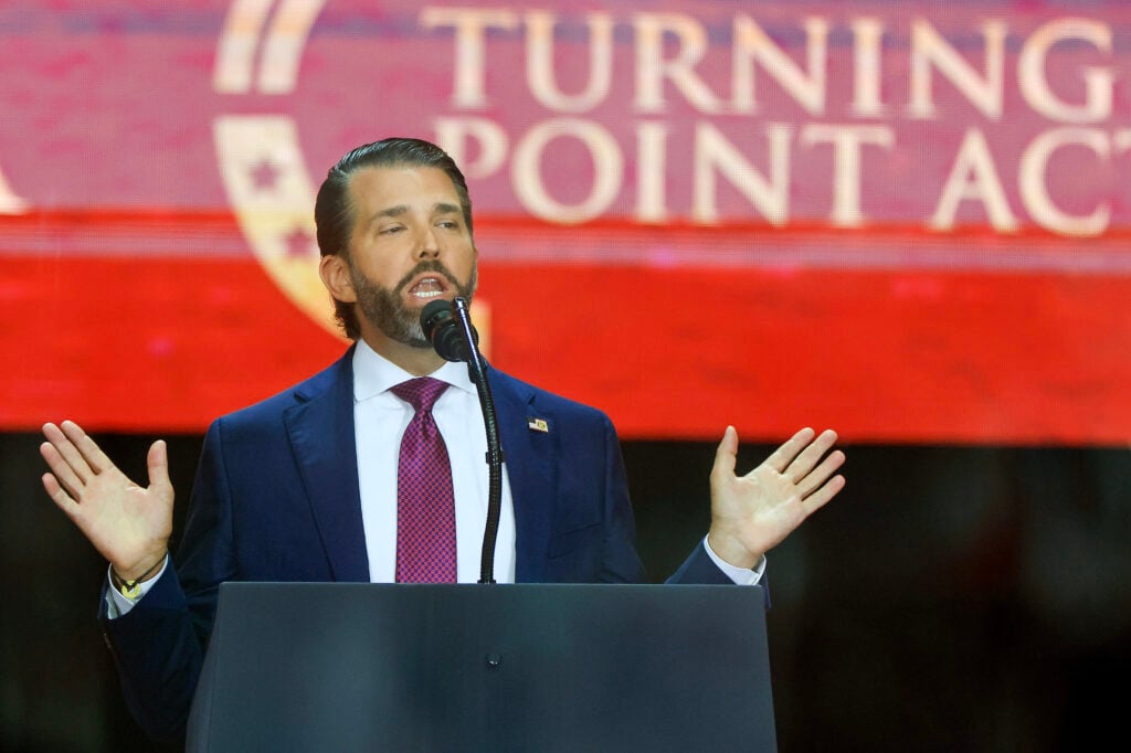 Donald Trump Jr. speaks during the memorial service for political activist Charlie Kirk at State Farm Stadium on September 21, 2025 in Glendale, Arizona.