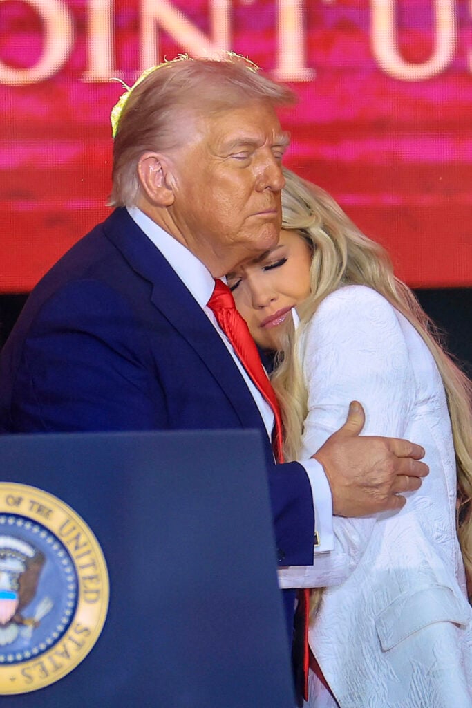 Erika Kirk joins U.S. President Donald Trump onstage during the memorial service for political activist Charlie Kirk at State Farm Stadium on September 21, 2025 in Glendale, Arizona. 