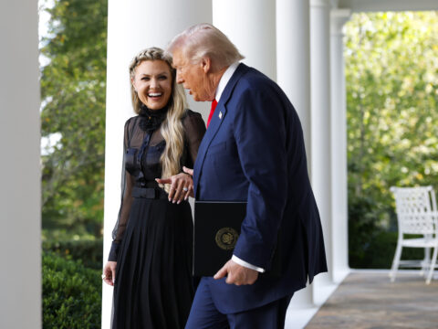 Erika Kirk, wife of late conservative activist Charlie Kirk, arrives with U.S. President Donald Trump as he posthumously awards the Presidential Medal of Freedom to Charlie Kirk during a ceremony in the Rose Garden of the White House on October 14, 2025 in Washington, DC.